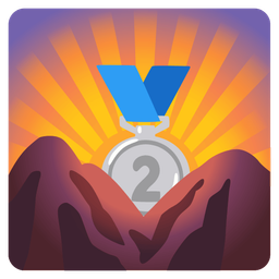 2nd place medal and sunrise over mountains