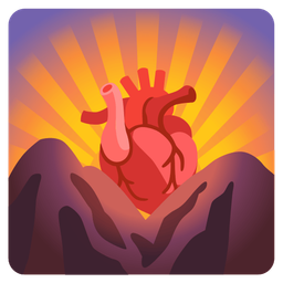 anatomical heart and sunrise over mountains