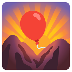 balloon and sunrise over mountains