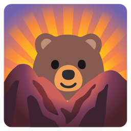 bear and sunrise over mountains