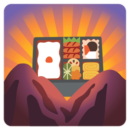 Bento box and Sunrise over mountains