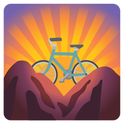bicycle and sunrise over mountains