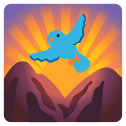 bird and sunrise over mountains