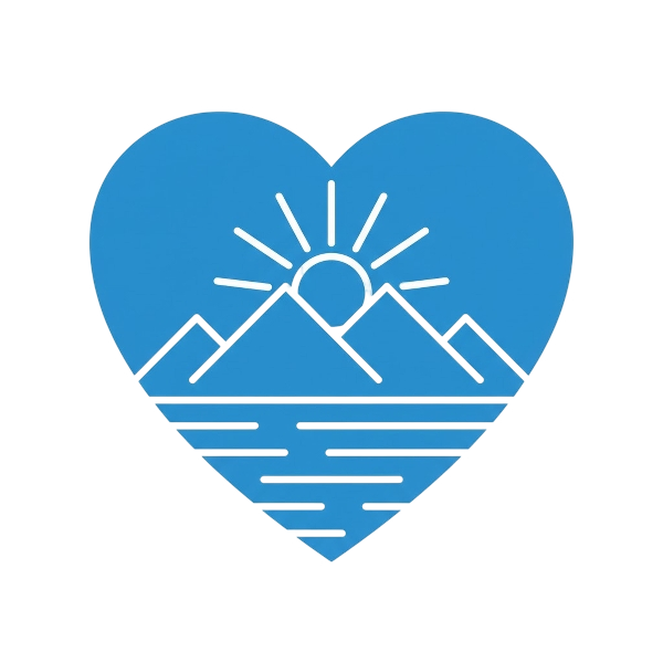 Blue heart and Sunrise over mountains