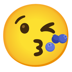 Blueberries and Face blowing a kiss