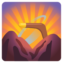 boomerang and sunrise over mountains