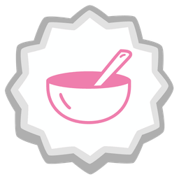 bowl with spoon and fish cake with swirl