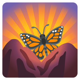 butterfly and sunrise over mountains