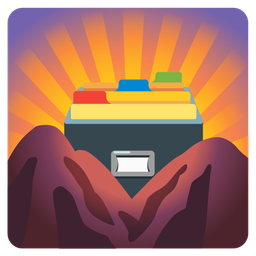 card file box and sunrise over mountains
