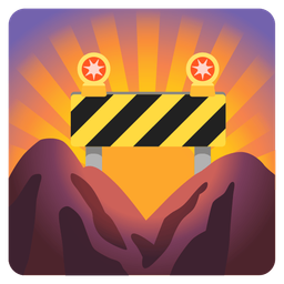 construction and sunrise over mountains