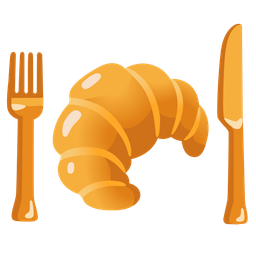 croissant and fork and knife with plate