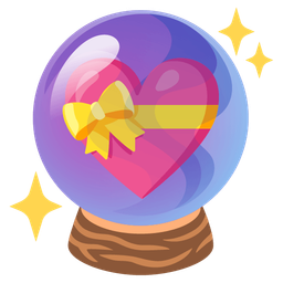 crystal ball and heart with ribbon