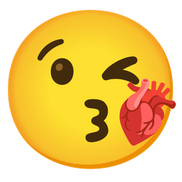 face blowing a kiss and anatomical heart
