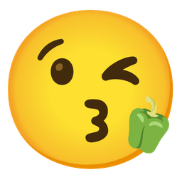 face blowing a kiss and bell pepper
