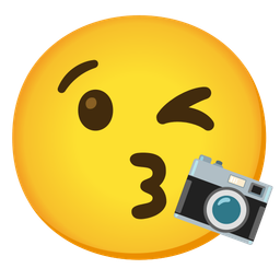 face blowing a kiss and camera