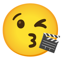 face blowing a kiss and clapper board
