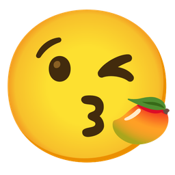 face blowing a kiss and mango