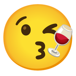 face blowing a kiss and wine glass