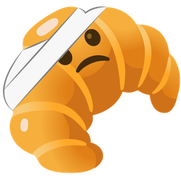 face with head-bandage and croissant