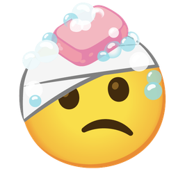 face with head-bandage and soap