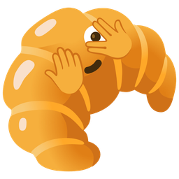 face with peeking eye and croissant