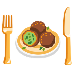 falafel and fork and knife with plate