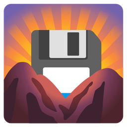 Floppy disk and Sunrise over mountains