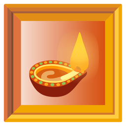 framed picture and diya lamp
