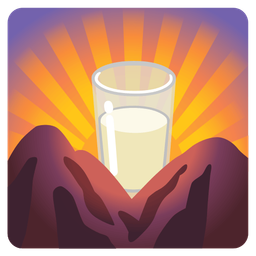 Glass of milk and Sunrise over mountains