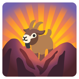 Goat and Sunrise over mountains