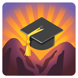 graduation cap and sunrise over mountains