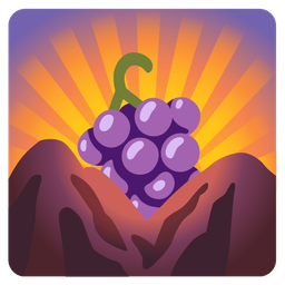 grapes and sunrise over mountains