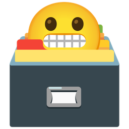 grimacing face and card file box