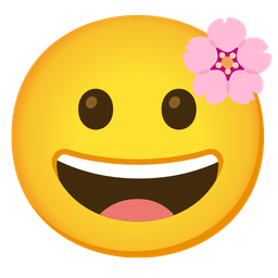 grinning face and cherry blossom
