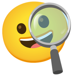 grinning face and magnifying glass tilted right