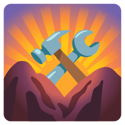 hammer and wrench and sunrise over mountains