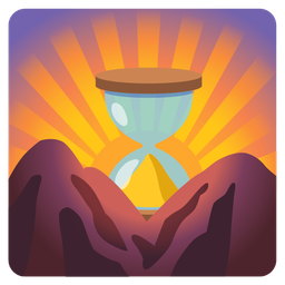 hourglass done and sunrise over mountains