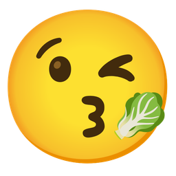 Leafy green and Face blowing a kiss
