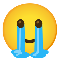 Loudly crying face and Slightly smiling face