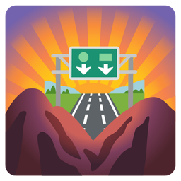 motorway and sunrise over mountains