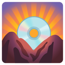 Optical disk and Sunrise over mountains