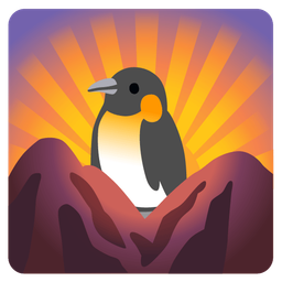 penguin and sunrise over mountains