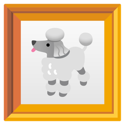 poodle and framed picture