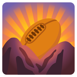 rugby football and sunrise over mountains