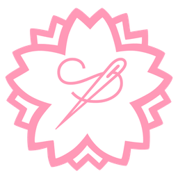 sewing needle and white flower