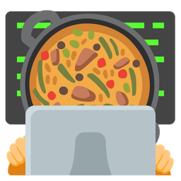 shallow pan of food and laptop