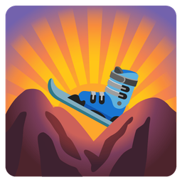 skis and sunrise over mountains