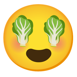 smiling face with heart-eyes and leafy green