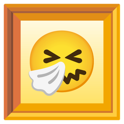 sneezing face and framed picture