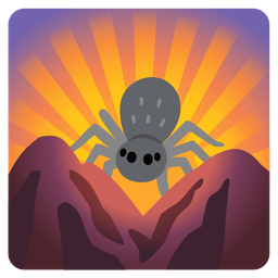 spider and sunrise over mountains